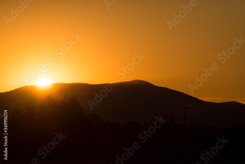 Fototapeta Naklejka Na Ścianę i Meble -  View of  sunset on the mountain background