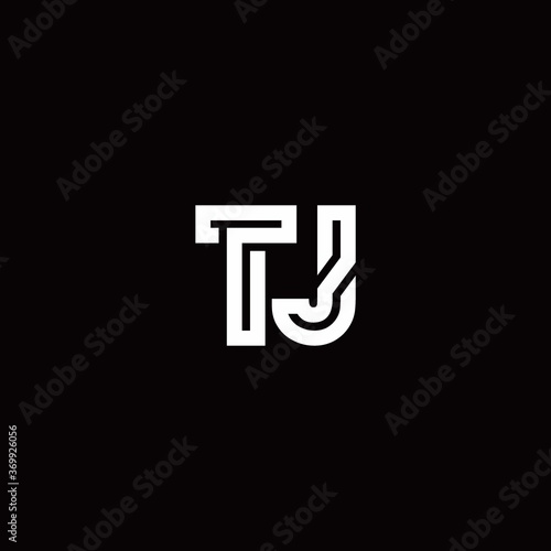 TJ monogram logo with abstract line