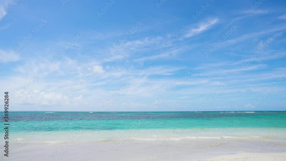 Crystal clear Hawaiian islands sea beach. White sand, clean beach, and blue sea and sky Crystal clear Hawaiian islands sea beach. White sand, clean beach, and blue sea and sky