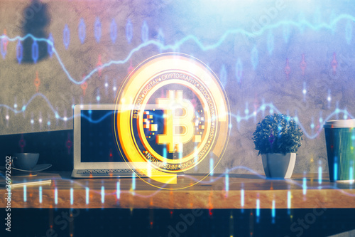 Multi exposure of blockchain theme hologram and table with computer background. Concept of bitcoin crypto currency. photo