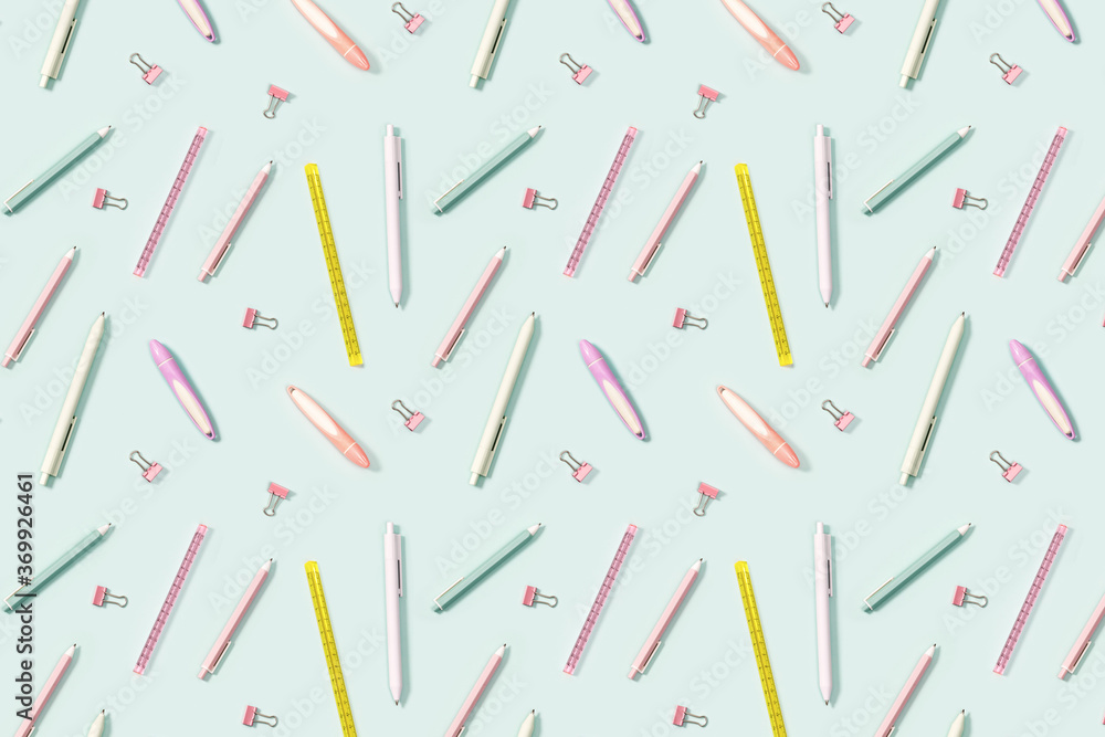 Pattern with office supplies, color pencils, pens, puler, markers and metal paper clips. Pattern with office supplies, color pencils, pens, puler, markers and metal paper clips.