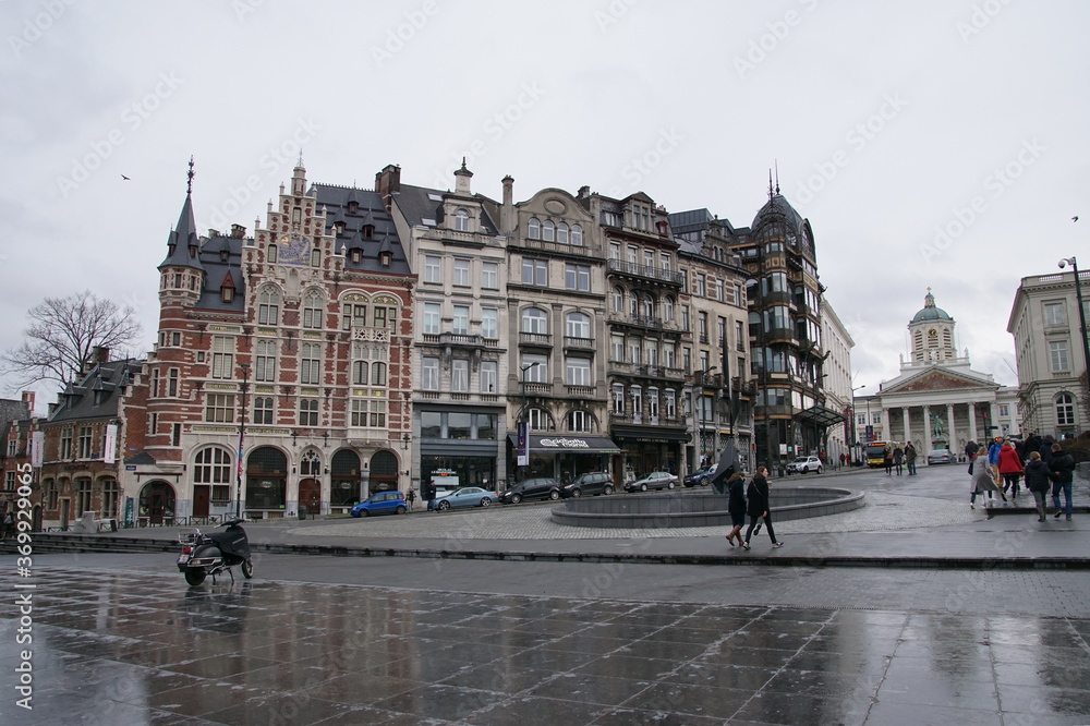 Beautiful ancient buildings and Brussels Royal Square with St Jacques Church at The Coudenberg. 