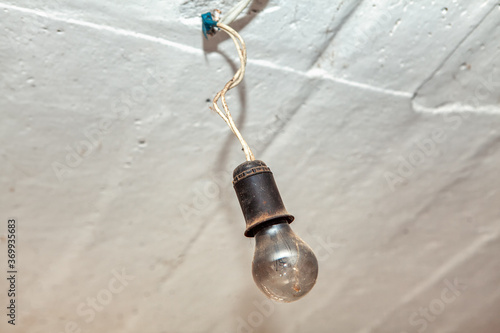 Old incandescent bulb . The old method of electric illumination photo