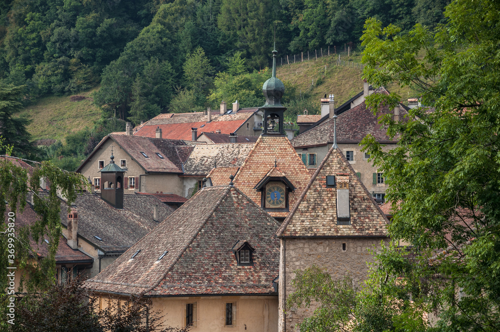 General view of old, medieval, romantic and tiny Romanmontier-Envy village, located in the district of Jura-Nord Vaudois, on Nozon river in Canton Vaud, Switzerland.