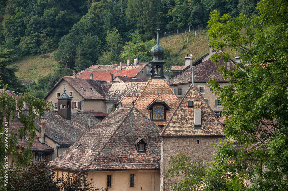 General view of old, medieval, romantic and tiny Romanmontier-Envy village, located in the district of Jura-Nord Vaudois, on Nozon river in Canton Vaud, Switzerland. General view of old, medieval, romantic and tiny Romanmontier-Envy village, located in the district of Jura-Nord Vaudois, on Nozon river in Canton Vaud, Switzerland.