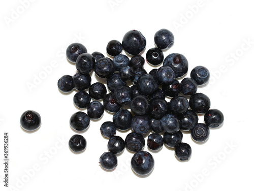 Closeup on ripe blueberries isolated on white background