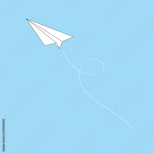 flying paper airplane on a blue background