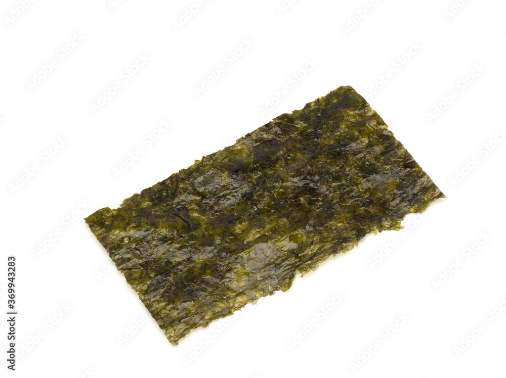 One roasted sheet of seaweed, isolated on white background. Asian healthy dry nori snack food. One roasted sheet of seaweed, isolated on white background. Asian healthy dry nori snack food.