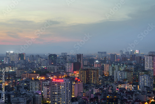Cityscape of Hanoi skyline in Cau Giay district by Cau Giay park during sunset time in Hanoi city  Vietnam