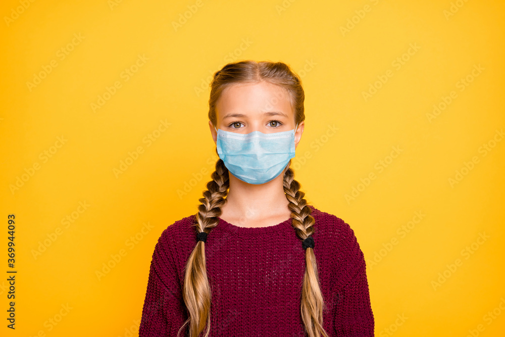 Close-up portrait of her she nice attractive healthy pre-teen girl wearing safety gauze mask mers cov season influenza prevention isolated bright vivid shine vibrant yellow color background Close-up portrait of her she nice attractive healthy pre-teen girl wearing safety gauze mask mers cov season influenza prevention isolated bright vivid shine vibrant yellow color background