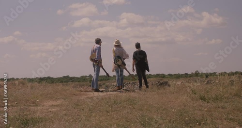 Three musician friends talk photo