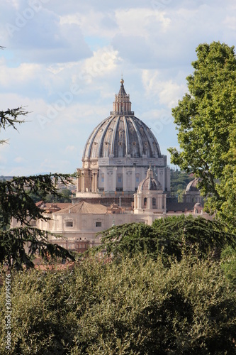 Dome of St. Peter Basilica, View from the top in Gianicolo hill Rome on cloudy day . Aerial picturesque view of Rome .Vatican museum, Rome cityscape.