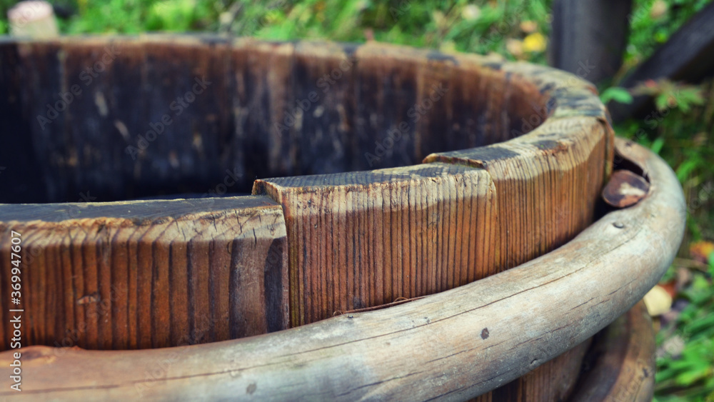 Old wooden barrel , a place for washing clothes
