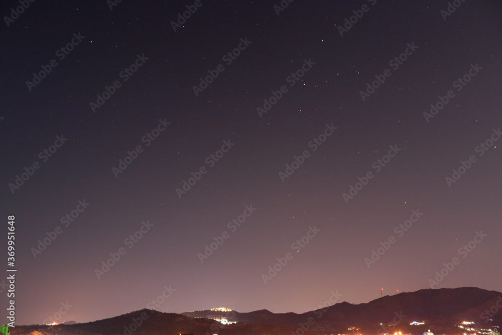 view of stars and mountain