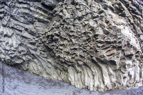 Basalt columns on a black beach in Iceland