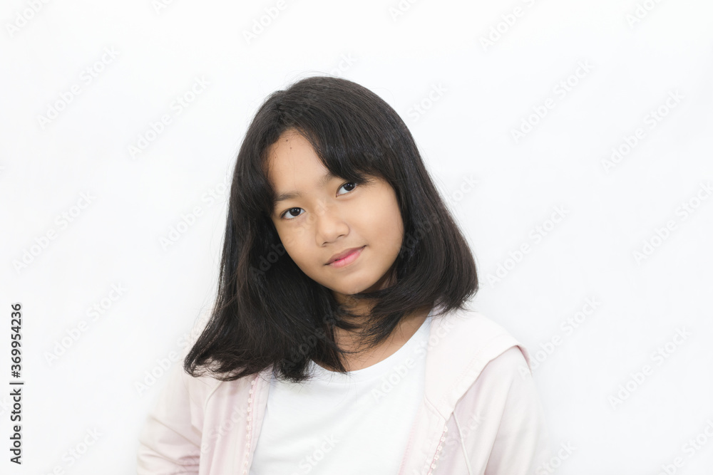Asian cute young girl with bright face on white background
Asian cute young girl with bright face on white background