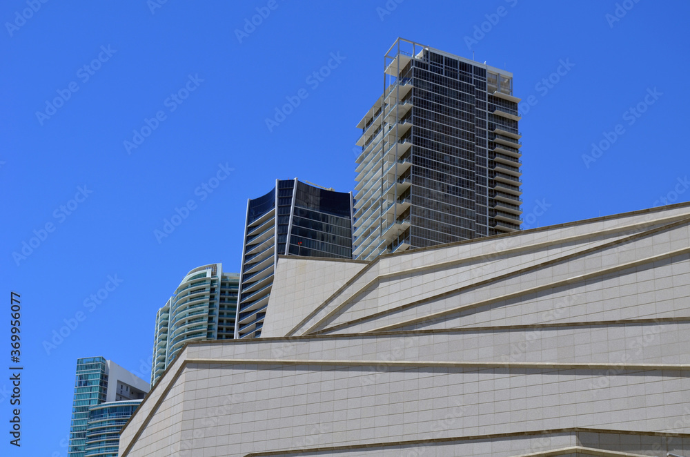 Exteriors of tall modern condos and a culture center in downtown Miami,Florida Exteriors of tall modern condos and a culture center in downtown Miami,Florida