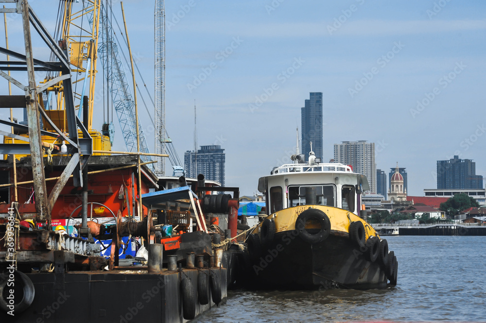 The Ferry was stopped at the pier for repairing at Chao praya river in Bangkok Thailand 