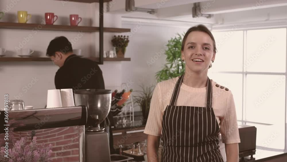 Barista concept. The shopkeeper is presenting the work process. 4k Resolution. Barista concept. The shopkeeper is presenting the work process. 4k Resolution.