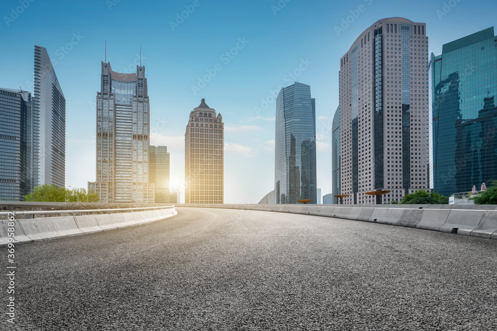 Fototapeta premium Roads and urban modern architecture office buildings
