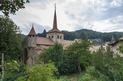 View of Romainmotier Abbey Church in Romanmontier-Envy village  one of the oldest Romanesque churches in the country   Canton Vaud  Switzerland.