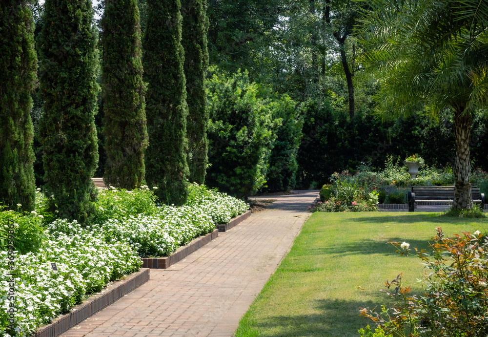 A garden walkway at botanical sanctuary in Spring, TX.