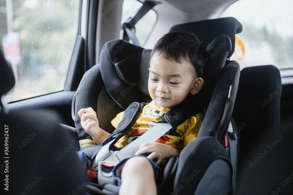 1 Year Old Adorable Asian Boy Alone Looking Around From Car Seat in the Car 1 Year Old Adorable Asian Boy Alone Looking Around From Car Seat in the Car