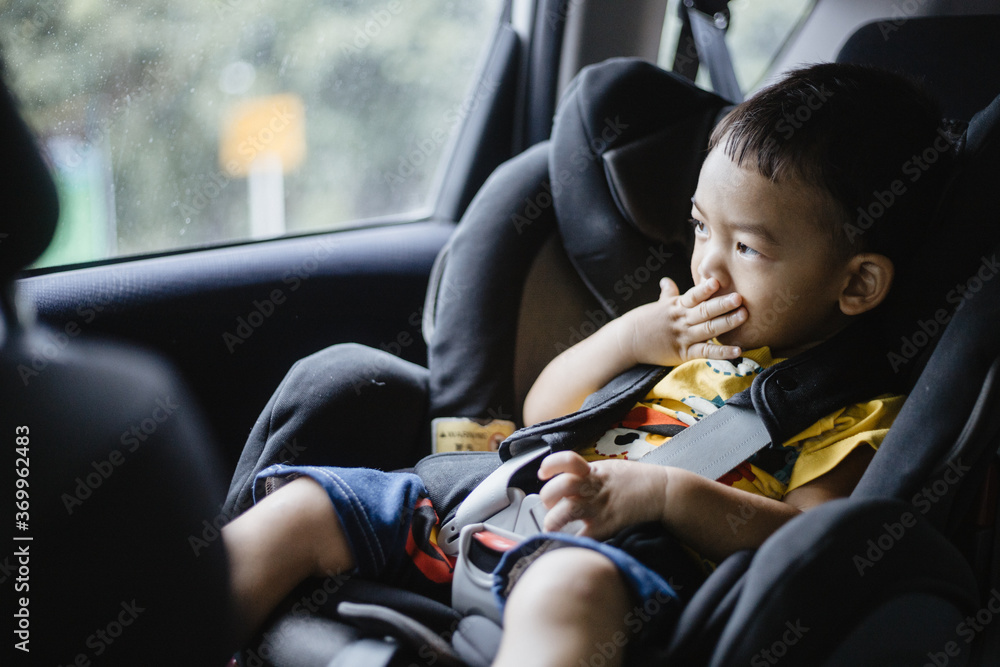 1 Year Old Adorable Asian Boy Alone Looking Around From Car Seat