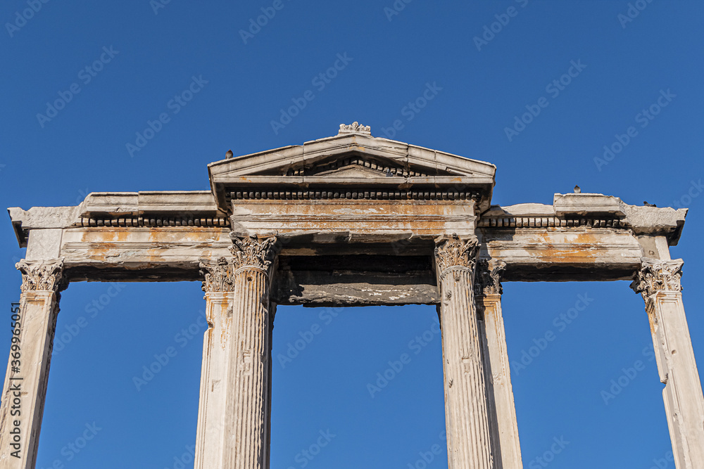 Famous Hadrian's Gate or Arch of Hadrian - one of the main landmarks of Athens. Arch of Hadrian erected in honor of Roman emperor Hadrian in 2nd century A.D. Athens, Greece.