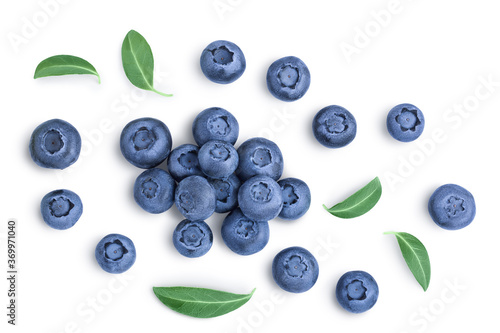 fresh ripe blueberry with leaves isolated on white background with clipping path . Top view. Flat lay pattern