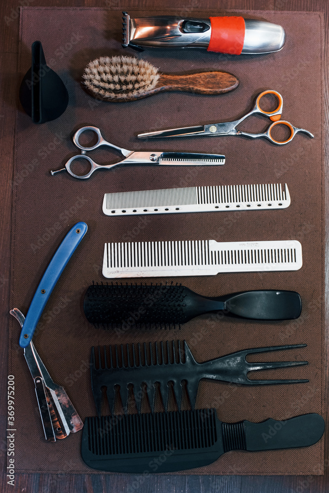 Close up view of vintage barber shop tools that lying down on the table