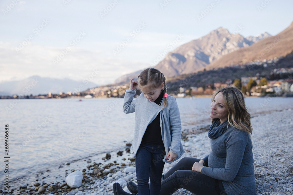 Mom and her daughter spending time together outdoors Mom and her daughter spending time together outdoors