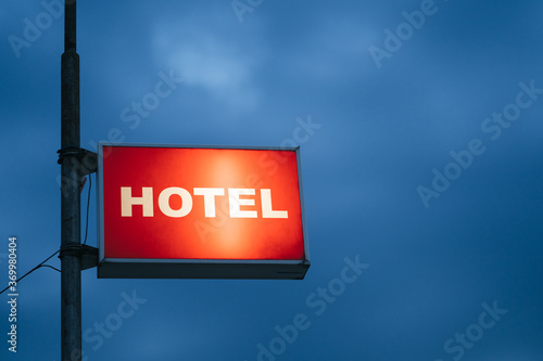 Red Hotel Signboard At Night. photo