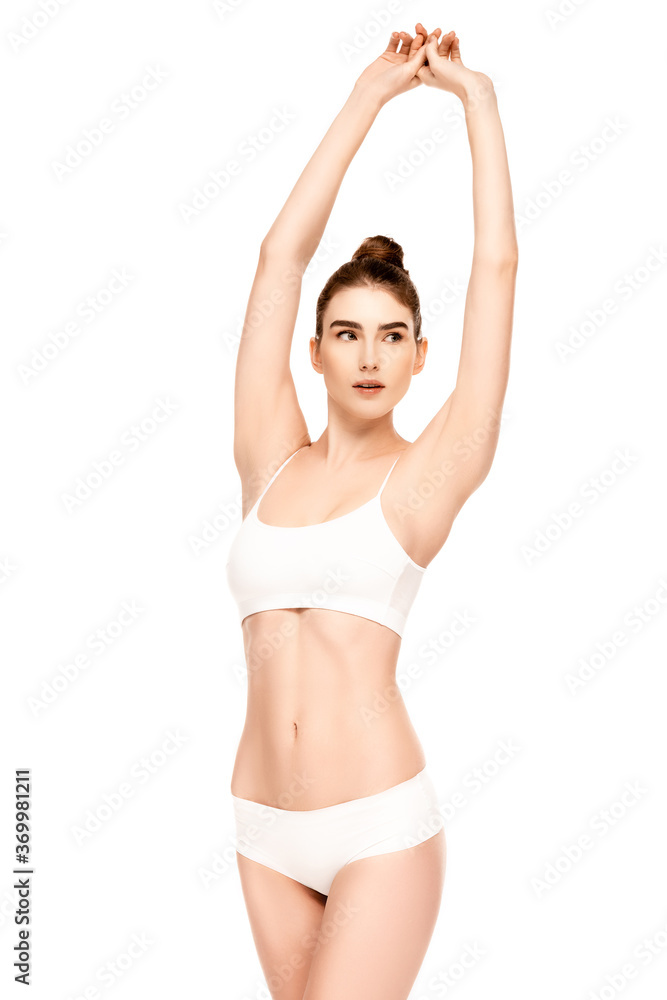 woman with perfect body in panties and top standing with hands above head isolated on white woman with perfect body in panties and top standing with hands above head isolated on white