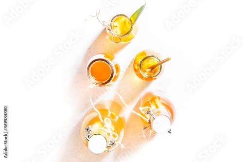 Selection Of Fermented Kombucha Drinks. Homemade probiotic superfood tea, keto diet drink, tepache, cider, kvass, ginger ale. Healthy flavored drink. Copy space. Top View © 5ph