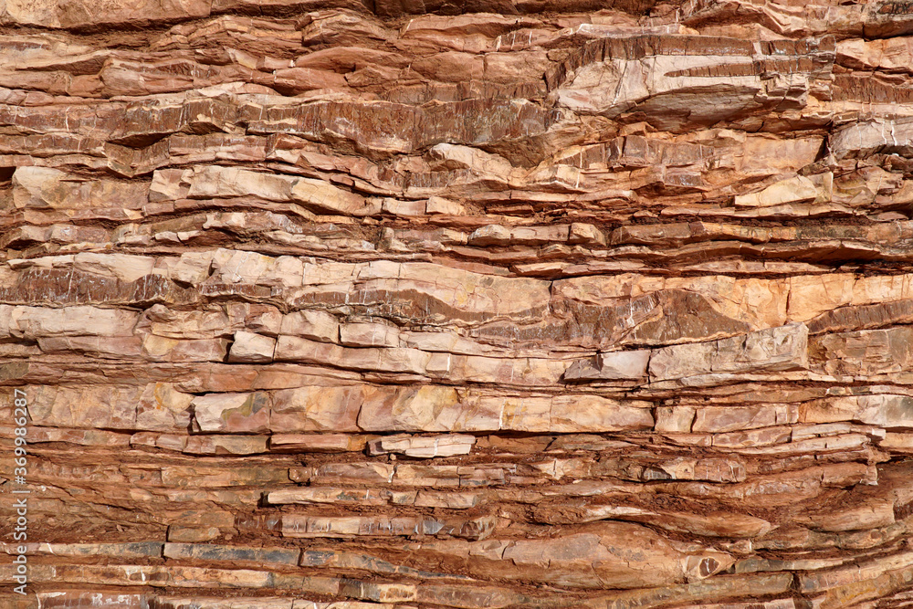   View of sedimentary rocks light brown, illuminated by the sun.