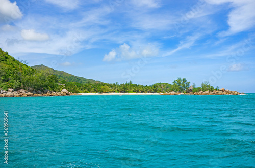 Shoreline of a tropical island in the Seychelles and view of the Ocean