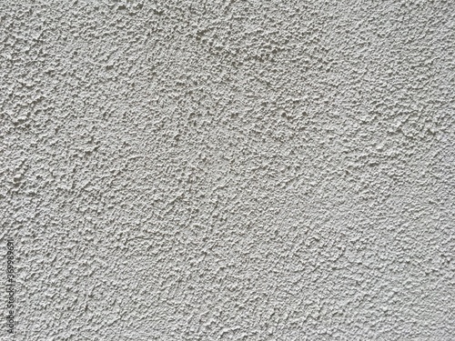 Gray concrete wall with rough finish