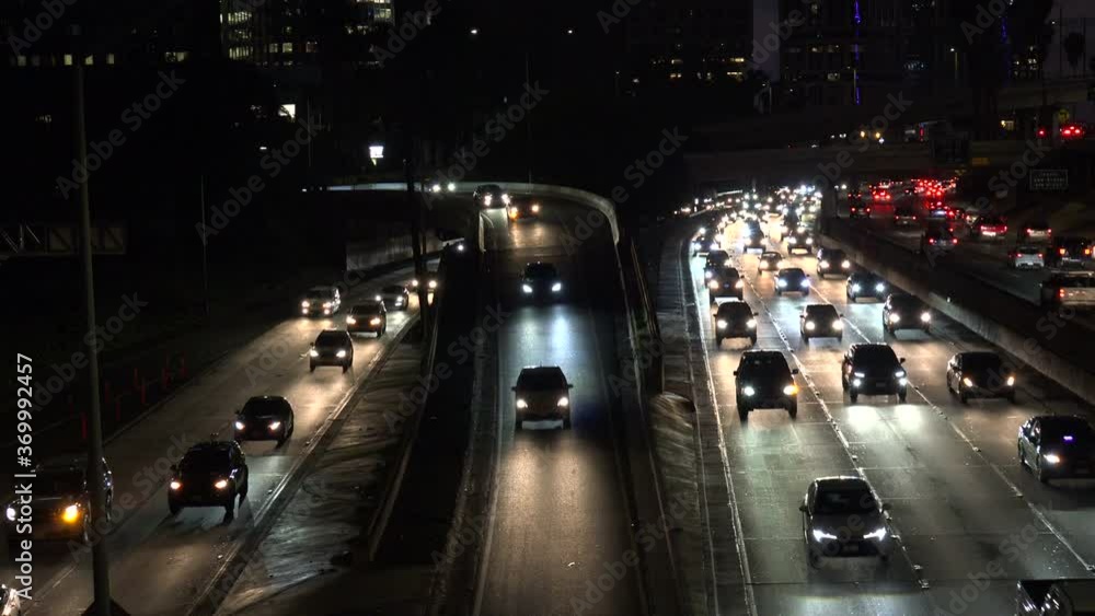 Traffic on a busy freeway interchange in the city at night Traffic on a busy freeway interchange in the city at night