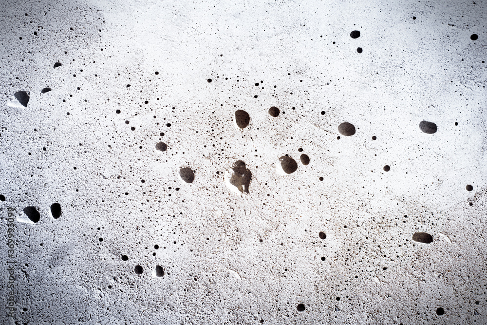 background of gray stone wall with holes background of gray stone wall with holes