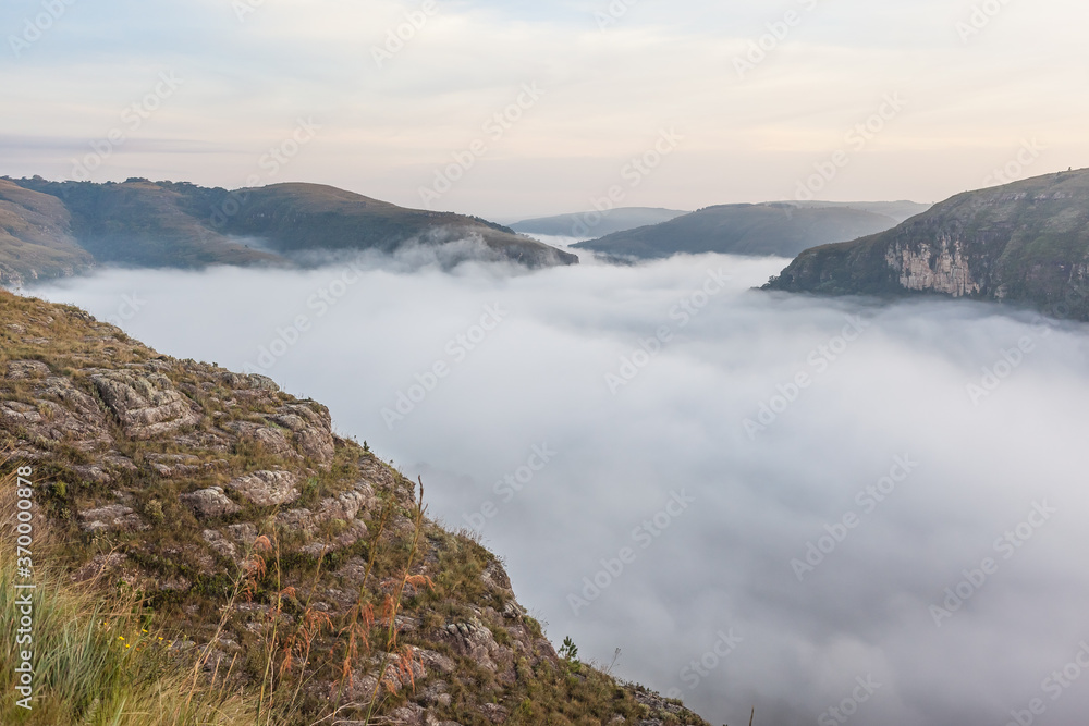 Dawn with fog at Guartela Canyon - sixth largest canyon in the world in length - Tibagi/ Parana - Brazil Dawn with fog at Guartela Canyon - sixth largest canyon in the world in length - Tibagi/ Parana - Brazil