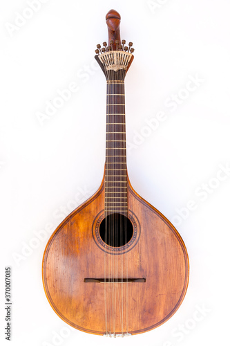 Portuguese guitar,  with tradicional fan (or peachow, watchkey) tuners - white background