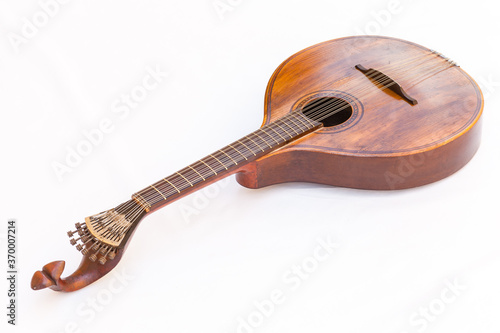 Portuguese guitar,  with tradicional fan (or peachow, watchkey) tuners - white background