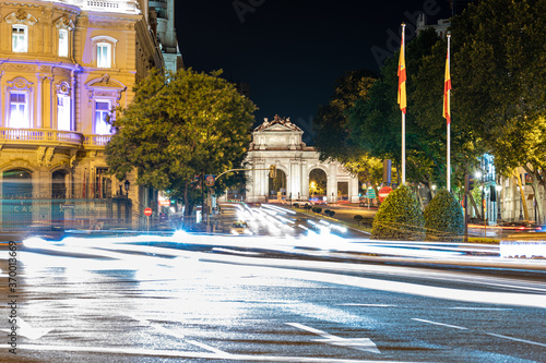 Night picture of Puerta de Alcala with traffic in Madrid, Spain
