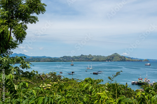 A view over Labuan Bajo harbour and Palua Karawo in early morning, Indonesia photo