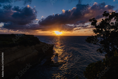 sunset on the cliffs On the arch of Anguilla island in the Caribbean sea