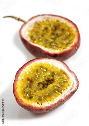 PASSION FRUIT passiflora edulis AGAINST WHITE BACKGROUND