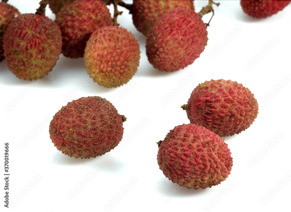 LITCHI OR LITCHEE litchi sinensis AGAINST WHITE BACKGROUND LITCHI OR LITCHEE litchi sinensis AGAINST WHITE BACKGROUND