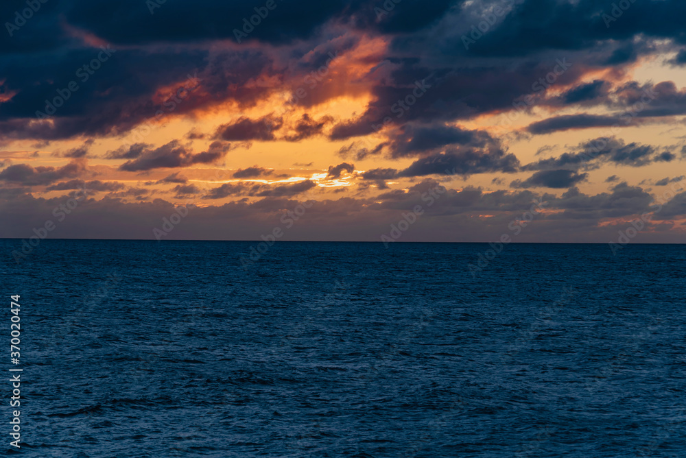 sunset on the cliffs On the arch of Anguilla island in the Caribbean sea