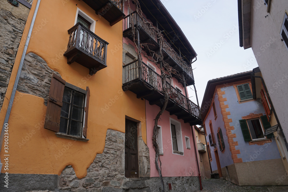 colorful houses on a narrow street in a small village in ticino